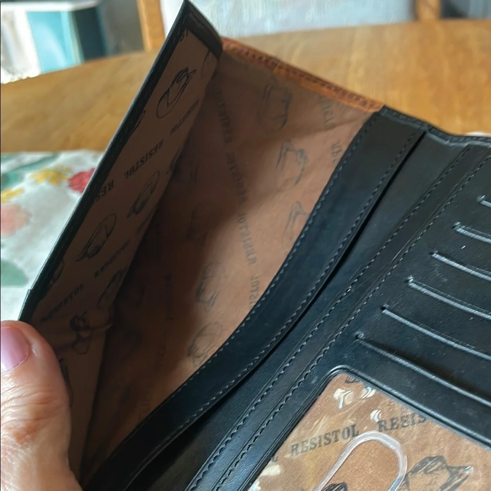 Elegant Resistol Black and Brown Leather Wallet